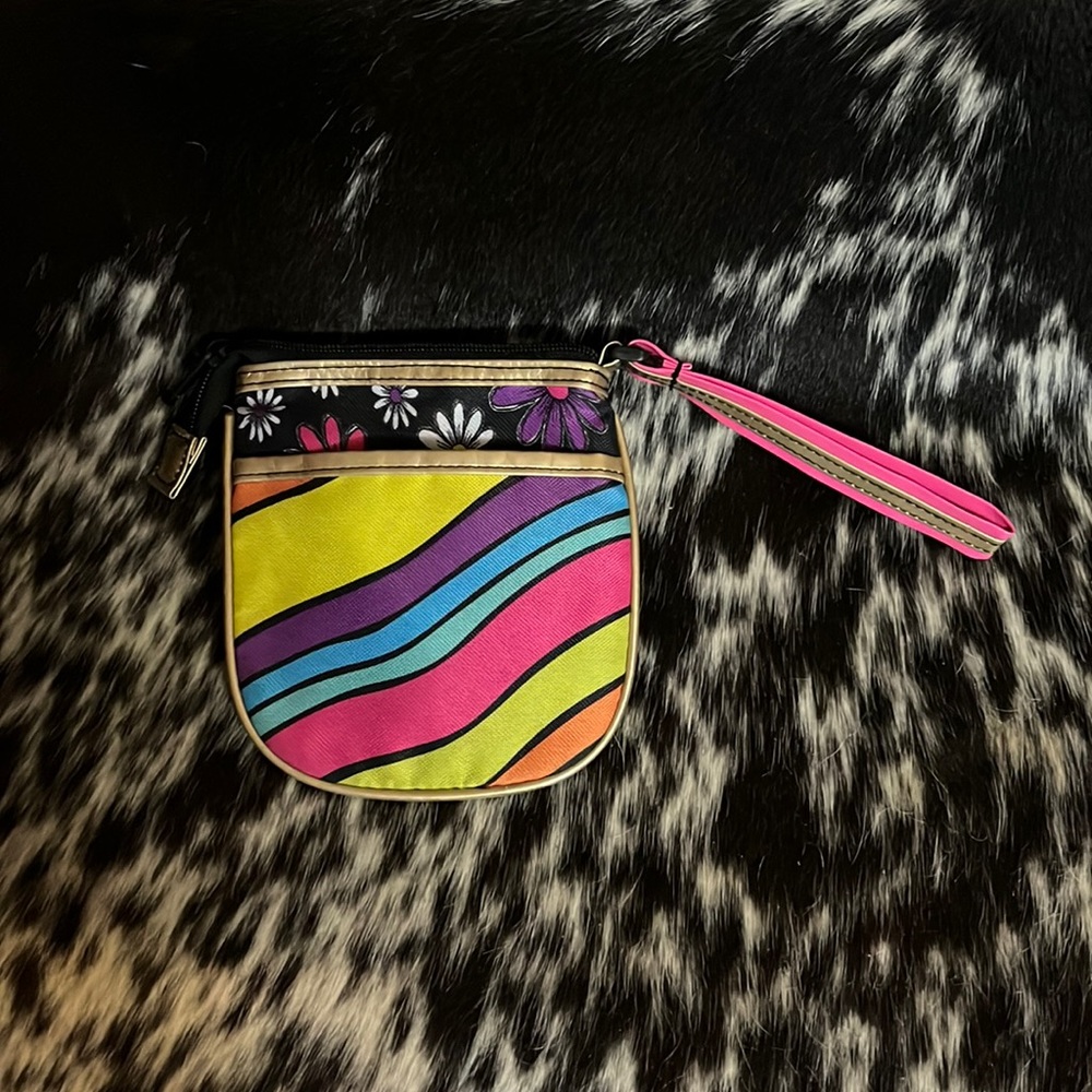 Little Brownie wristlet with bright colored daisies and stripes